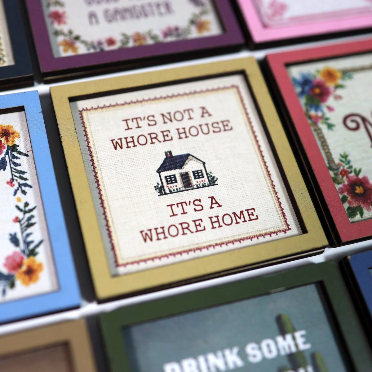 it's not a whore house. it's a whore home - wooden magnet