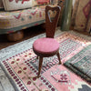 vintage wooden three legged birthing chair with rose seat {shipping not available}