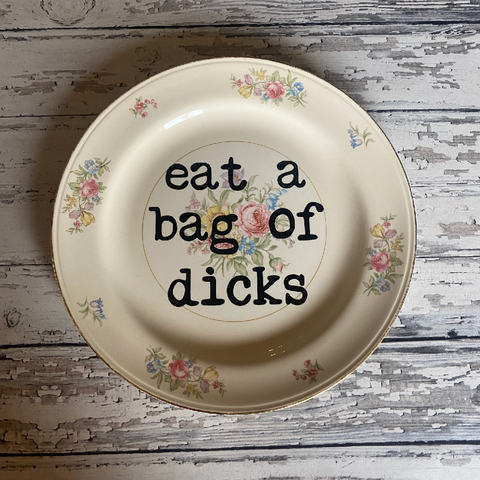 eat a bag of dicks decorative plate