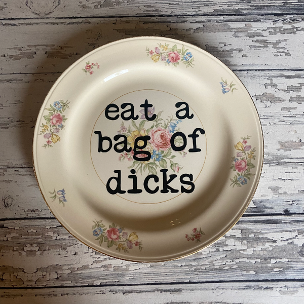 eat a bag of dicks decorative plate