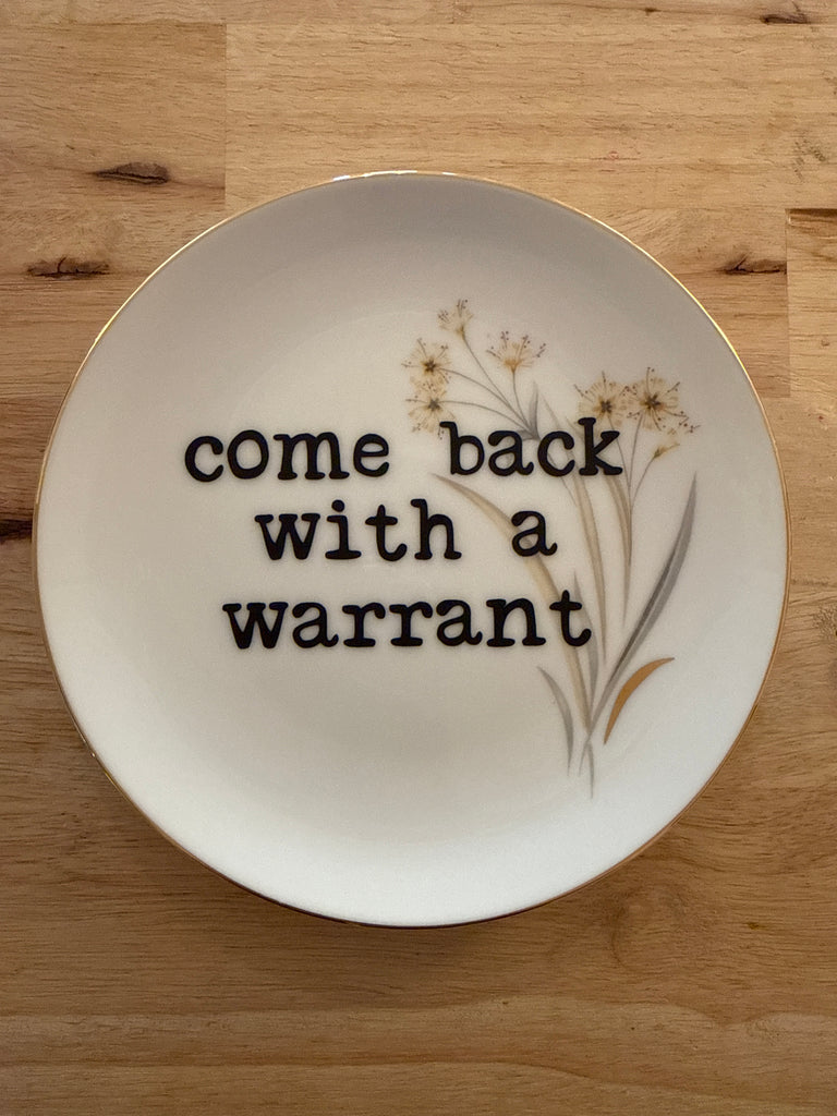 come back with a warrant plate