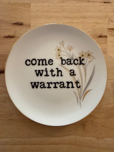 come back with a warrant plate
