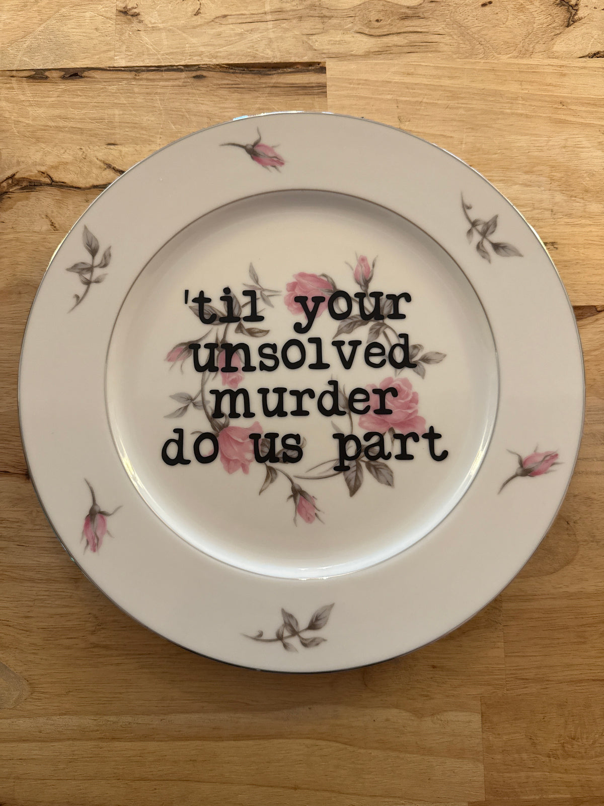unsolved murder plate