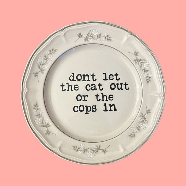 don't let the cat out or the cops in decorative plate