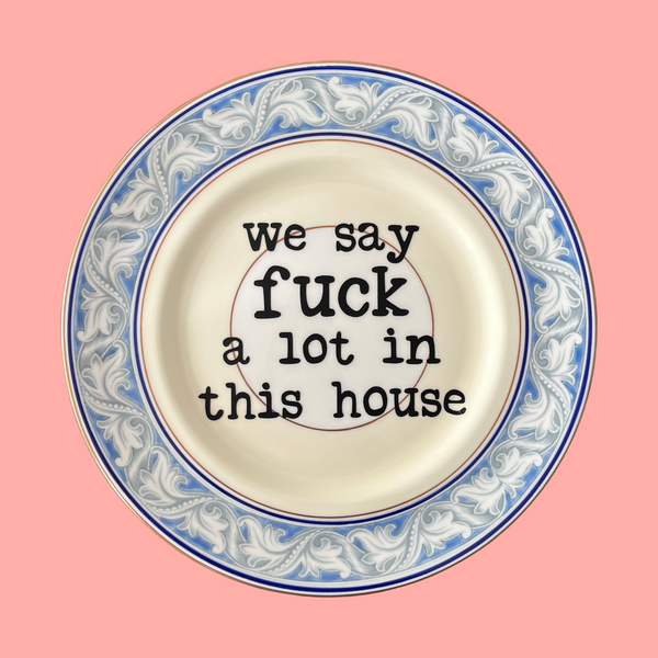 we say fuck a lot in this house decorative plate