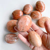 peach moonstone palm stone - Apple & Oak